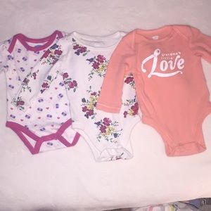 Three long sleeve onesies